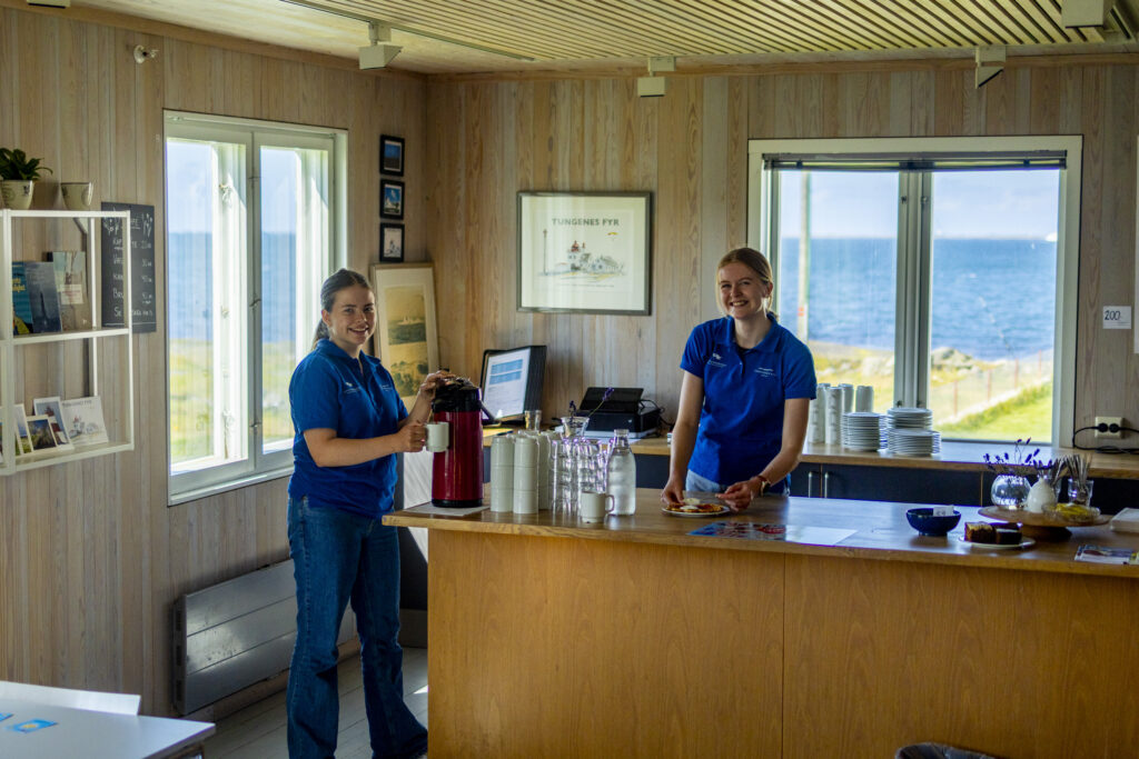 Museum workers at Tungenes lighthouse preparing home made waffles and coffee, ready to offer you a guided tour of the lighthouse